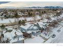 Aerial view of a residential neighborhood in winter at 1524 E Weldona Way, Superior, CO 80027