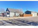 Bungalow with detached garage and fenced backyard at 304 Mckinley Ave, Fort Lupton, CO 80621