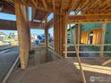 Interior construction framing showing window openings and the outdoor equipment at 3379 Danzante Bay Ct, Berthoud, CO 80513