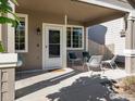 Front porch with seating area, perfect for relaxing outdoors at 3557 Blanca Peak Dr, Superior, CO 80027