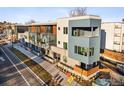 Modern townhome community nestled near a tree-lined street at 2110 Folsom St, Boulder, CO 80302