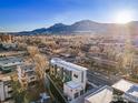 Complex of modern townhomes with mountain backdrop at 2110 Folsom St, Boulder, CO 80302