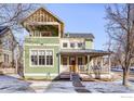 Two-story craftsman style home with a large porch at 2613 Thornbird Pl, Boulder, CO 80304