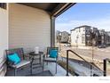 Cozy front porch with seating area and street view at 616 Discovery Pkwy, Superior, CO 80027