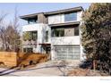 Contemporary home with attached garage and wood fence at 635 Arapahoe Ave # A, Boulder, CO 80302