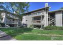 Attractive exterior of a two-story building with balconies and landscaping at 695 Manhattan Dr # 22, Boulder, CO 80303