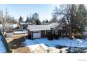 Ranch style home with a single car garage at 1011 Yeager Dr, Longmont, CO 80501