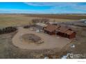 House and property shown from above, showcasing its size and landscape at 2244 County Road 12, Erie, CO 80516