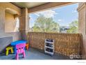 Private balcony with city views and space for plants at 2321 Calais Dr # 15B, Longmont, CO 80504