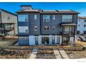 Townhome community with solar panels and a walkway at 2446 W 167Th Ln, Broomfield, CO 80023