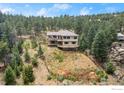 House with large deck and scenic mountain views at 309 Sunrise Ln, Boulder, CO 80302