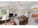 Spacious living room with fireplace and high ceilings at 309 Sunrise Ln, Boulder, CO 80302