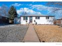 Newly painted ranch home with landscaped front yard at 8861 Hastings Way, Westminster, CO 80031