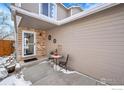 Attractive front entrance with a small sitting area at 421 Stevens Cir, Platteville, CO 80651