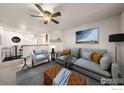 Living room featuring a sofa, armchair, and coffee table at 5425 County Road 32, Mead, CO 80504