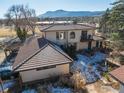 Aerial view showcasing the home's expansive backyard and mountain backdrop at 1865 Upland Ave, Boulder, CO 80304