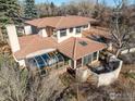 Stunning aerial view of the home, showcasing its unique design and backyard at 1865 Upland Ave, Boulder, CO 80304