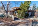 Two-story home with landscaped yard and mountain views at 1865 Upland Ave, Boulder, CO 80304