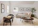 Bright living room with comfy seating, a stylish coffee table, and natural light at 2130 22Nd St, Boulder, CO 80302