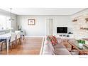 Spacious living room with hardwood floors and stone fireplace at 2870 15Th St, Boulder, CO 80304