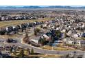 Community overview featuring a golf course and mountain views at 4355 W 107Th Dr, Westminster, CO 80031