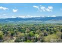 Breathtaking view of snow-capped mountains and lush green landscape, showcasing the natural beauty of the area at 4667 Ashfield Dr, Boulder, CO 80301