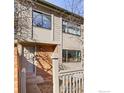 Two-story townhome with a brick facade and private entrance at 616 Quince Cir, Boulder, CO 80304