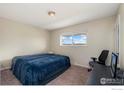 Spacious bedroom with a view and workspace at 8778 Mariposa St, Thornton, CO 80260