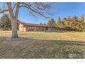 Ranch style home with mature trees and spacious yard at 8847 Quail Rd, Longmont, CO 80503