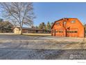 Large barn style garage with double doors at 8847 Quail Rd, Longmont, CO 80503