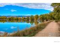 Peaceful lakefront property with walking path and scenic mountain views at 4840 Twin Lakes Rd # 7, Boulder, CO 80301