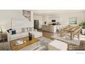 Open concept living and kitchen area with an island and modern furniture at 2243 Crosswind St, Fort Lupton, CO 80621
