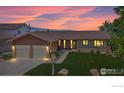 Two-car garage, beautifully landscaped front yard, ranch style home at 3215 Lafayette Dr, Boulder, CO 80305