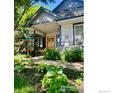 Charming home exterior displaying a well-manicured yard and welcoming front porch at 7909 Fairfax Ct, Niwot, CO 80503