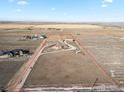 Wide shot of property showing house and large acreage at 14219 County Road 22, Fort Lupton, CO 80621