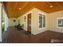 Inviting front porch with wood flooring and comfortable seating area at 1430 Balsam Ave, Boulder, CO 80304