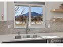 Modern kitchen sink with mountain views at 200 Fox Dr, Boulder, CO 80303