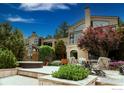 Spacious backyard with patio, hot tub, and mountain views at 45 Bellevue Dr, Boulder, CO 80302