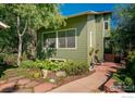 Charming home exterior with landscaped front yard and inviting walkway at 1095 Quince Ave, Boulder, CO 80304