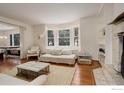 Spacious living area with bay window and comfy seating at 133 Mine Ln, Boulder, CO 80302