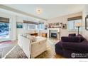 Bright living room with fireplace and hardwood floors at 1841 Columbine Ave, Boulder, CO 80302