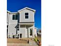 New gray townhome with front entry and landscaping at 2150 Violet Ave, Boulder, CO 80304