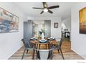 Bright dining area with round table and modern chairs near kitchen at 2663 Lloyd Cir, Boulder, CO 80304