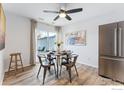 Charming dining area with round table and modern chairs near sliding door at 2663 Lloyd Cir, Boulder, CO 80304