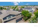 Modern home's exterior, aerial view showcasing neighborhood at 3255 Ouray St, Boulder, CO 80301