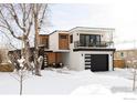 Modern two-story home with wood and stucco siding, snowy landscape at 3560 16Th St, Boulder, CO 80304