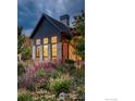 Evening view of home exterior showcasing landscaping at 3621 21St St, Boulder, CO 80304