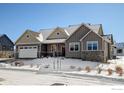 Two-story craftsman style home with a large front yard and attached garage at 1393 Sara Lynn Ln, Berthoud, CO 80513