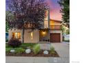 Contemporary two-story house with a welcoming front porch and walkway at 1531 Dellwood Ave, Boulder, CO 80304