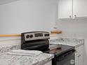 Modern kitchen features granite countertops and stainless steel appliances at 2707 Valmont Rd # 307D, Boulder, CO 80304